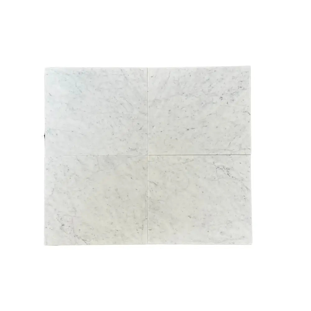 Square Carrara White Royale Marble tiles in 3x6 tumbled arrangement