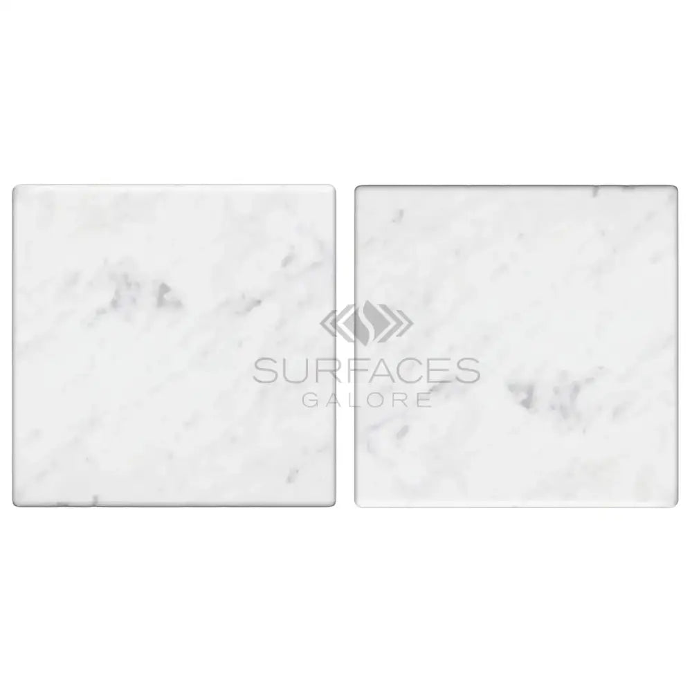 Two square Carrara White Royale Marble tiles 6x6 Tumbled for flooring or backsplash