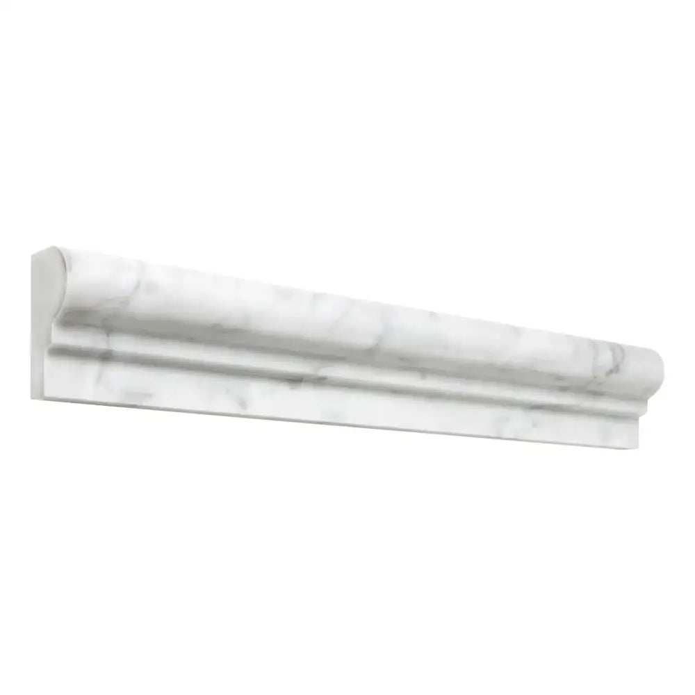 Carrara White Royale OG-1 marble baseboard trim with rounded top edge and recessed channel