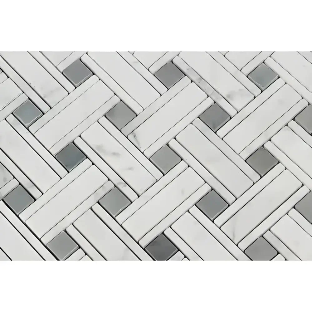 White and gray marble mosaic tile with herringbone pattern in Carrara White Royale Triple-Weave