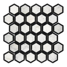 Hexagonal marble mosaic tile in black and white for elegant flooring or backsplash design