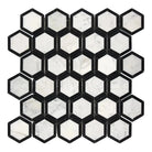 Hexagonal Carrara White marble mosaic tile sheet with black accents for elegant flooring