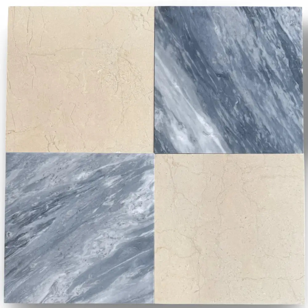 Four square marble tiles featuring Bardiglio Prime and Crema Marfil colors