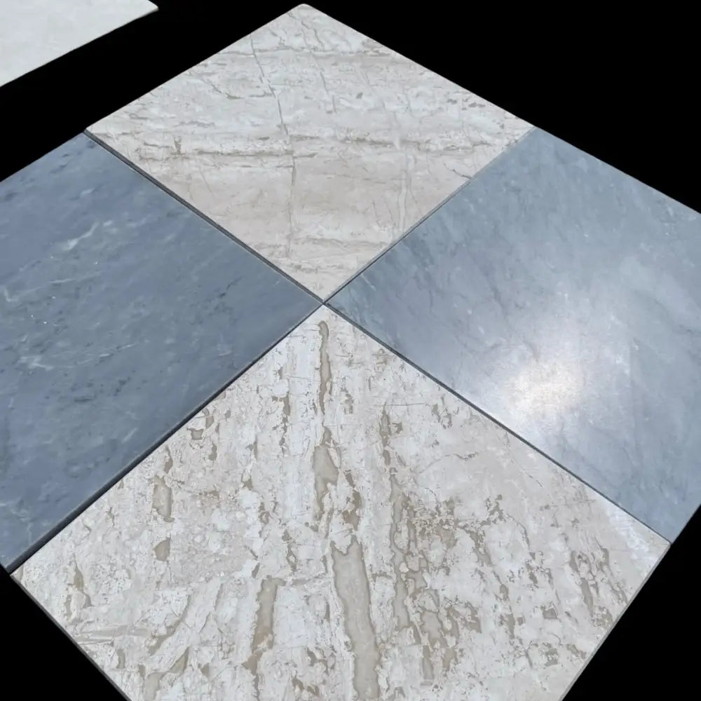 Four marble tiles from Checkerboard Bardiglio Prime and Diano Royal Marble 12x12 Set