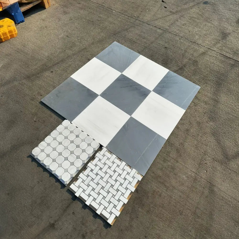 Assorted tile samples from Checkerboard Bardiglio Imperiale and Bianco Dolomite Marble 18X18 Set
