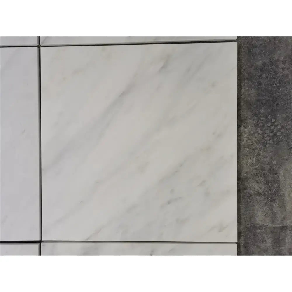 White marble tile from Checkerboard Bardiglio Prime Imperiale and Oriental White Aurora Marble set