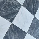Black and white marble tile pattern featuring Bardiglio Prime Nuvolato and Aurora White Asian Statuary