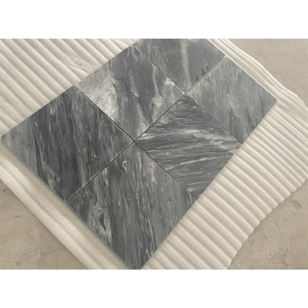 Gray marble tile arrangement from Checkerboard Bardiglio Prime Nuvolato and Thassos Supreme 12X12 Set