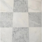 Square marble tile arrangement from Checkerboard Carrara White Royale and Aurora White set
