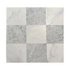 Nine square marble tiles from the Checkerboard Carrara White Royale Aurora White set