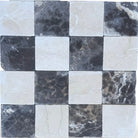 Checkerboard pattern of Crema Marfil Select and Emperador Dark Oro marble tiles