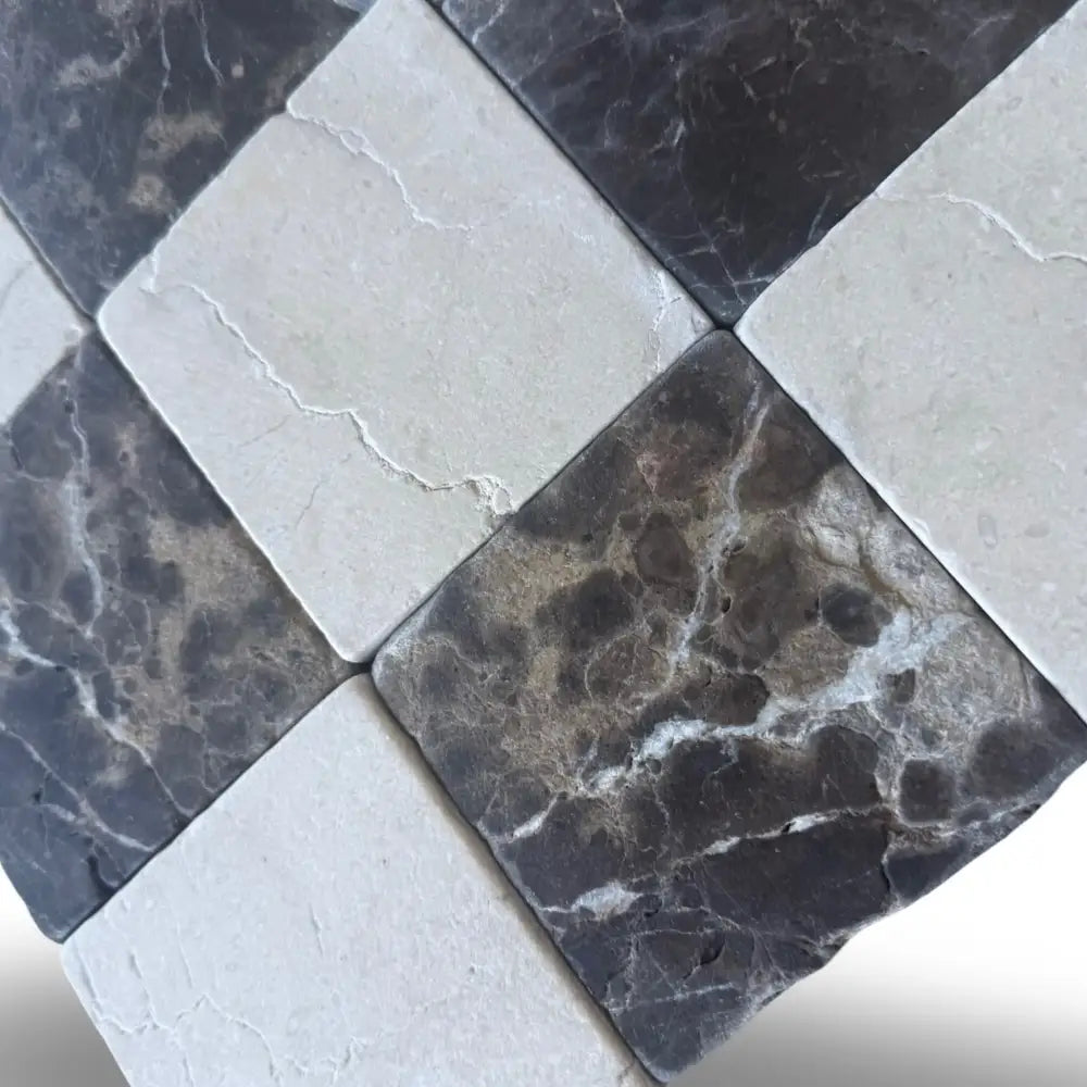 Checkerboard marble tiles from Crema Marfil Select and Emperador Dark Oro Tumbled Set