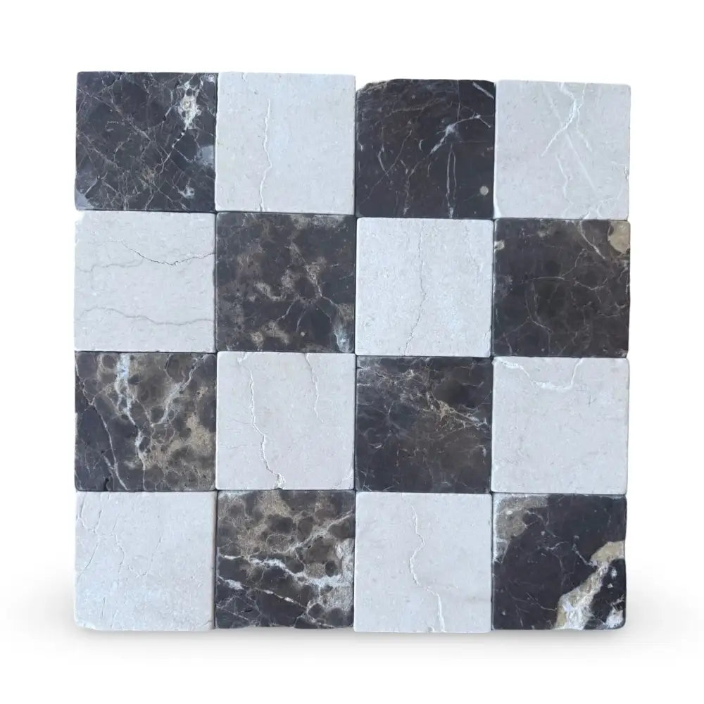 Checkerboard pattern of Crema Marfil Select and Emperador Dark Oro marble tiles
