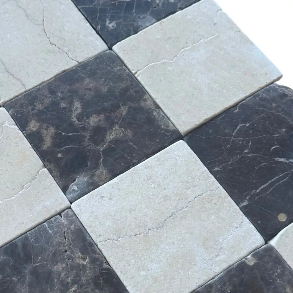 Checkerboard marble tiles from Crema Marfil Select and Emperador Dark Oro Tumbled Set