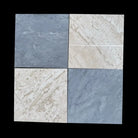 Four marble-patterned tiles from Checkerboard Crema Marfil Select and Emperador Dark Oro Tumbled Set