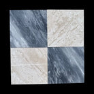 Four marble-patterned tiles from Checkerboard Crema Marfil Select and Emperador Dark Oro Tumbled Set