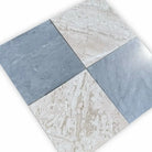 Four square marble tiles in Checkerboard Crema Marfil Select and Emperador Dark Oro Tumbled Set