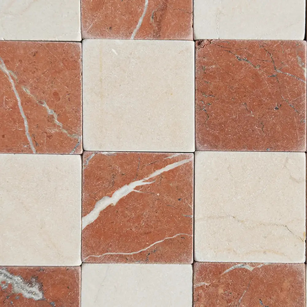 Checkerboard marble tile pattern of Crema Marfil Select and Rojo Alicante Select 3x3 Tumbled