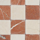 Checkerboard marble tile pattern of Crema Marfil Select and Rojo Alicante Select 3x3 Tumbled