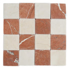 Checkerboard marble tile pattern featuring Crema Marfil and Rojo Alicante for elegant flooring