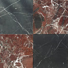 Four marble tiles from Checkerboard Bianco Dolomite and Crema Marfil 12X12 Set