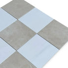 Alternating gray and white square tiles in Checkerboard Bianco Dolomite and Crema Marfil Set