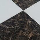 Alternating dark Dolomite and white Emperador Dark Oro tiles in Checkerboard pattern