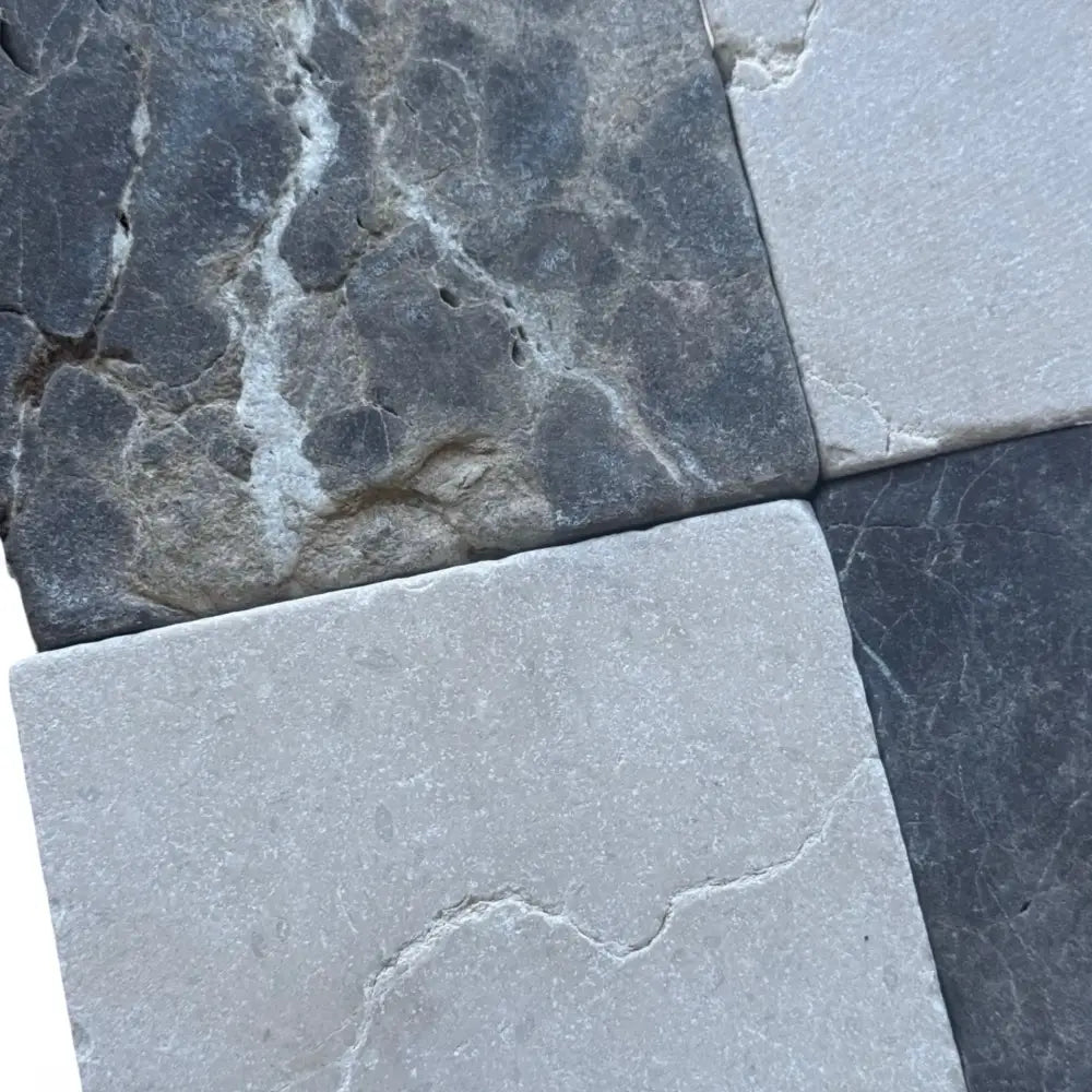 Four marble square tiles from Checkerboard Emperador Dark Oro and Crema Marfil Set