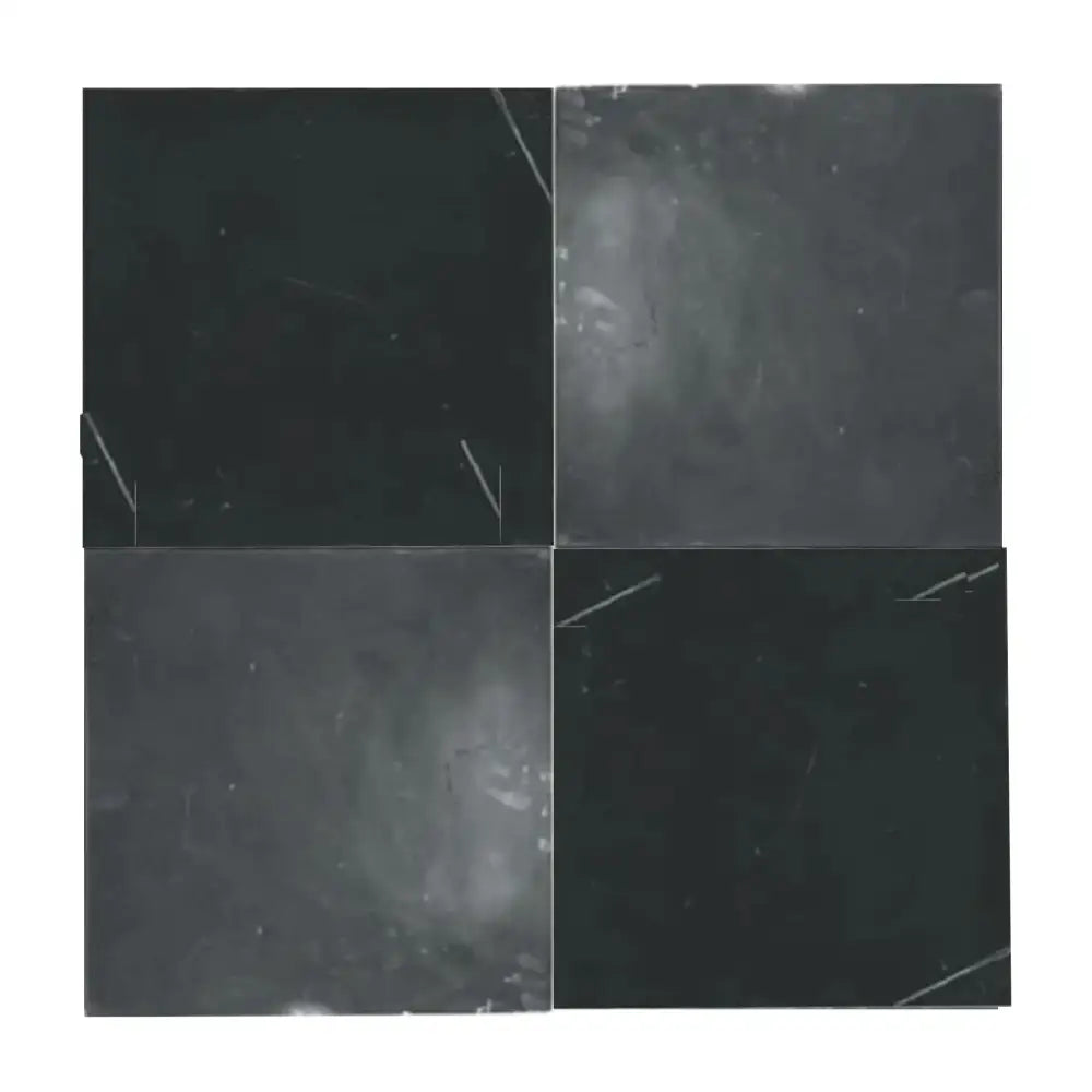 Four dark Nero Marquina and Arabescato Corchia marble square tiles in a 12x12 set