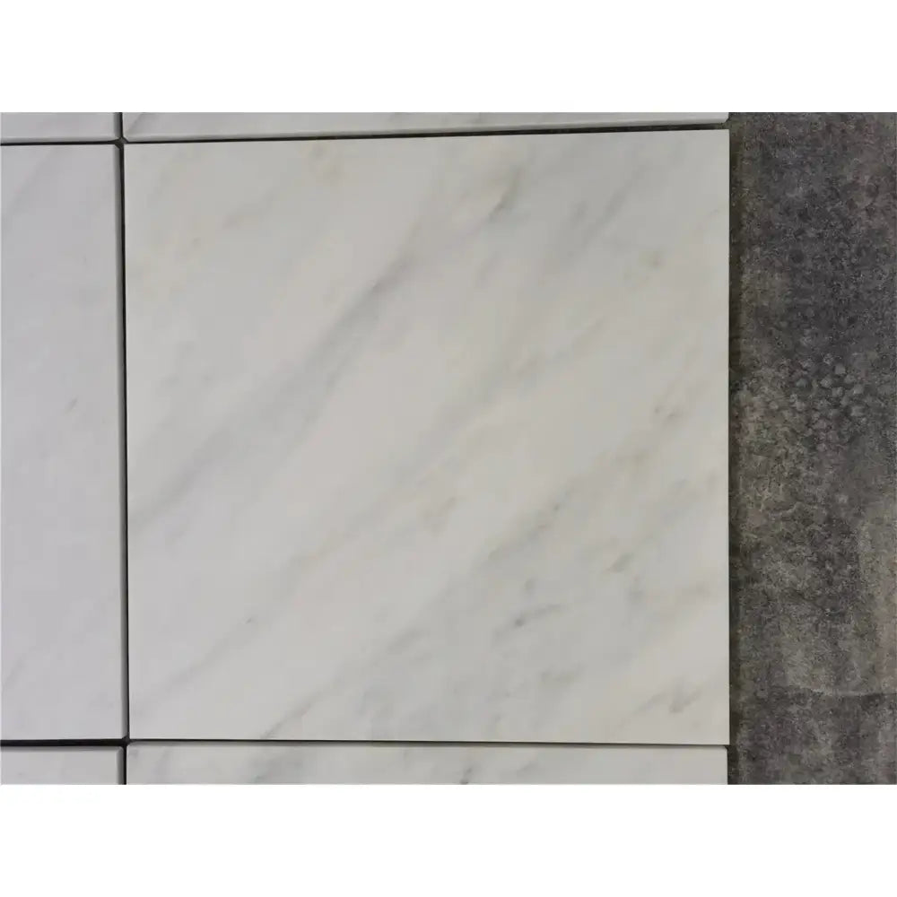 Square marble tile from Checkerboard Oriental White Aurora White Aurora and Nero Marquina Prestige Marble set
