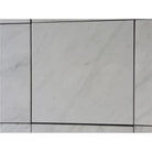 White marble tiles from Checkerboard Oriental White Aurora and Nero Marquina Prestige set