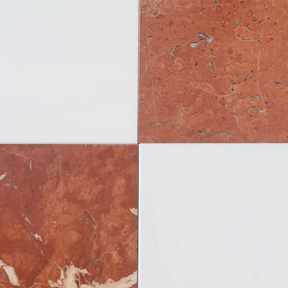 Checkerboard pattern of Red Marble Rojo Alicante and White Dolomite Prestige tiles