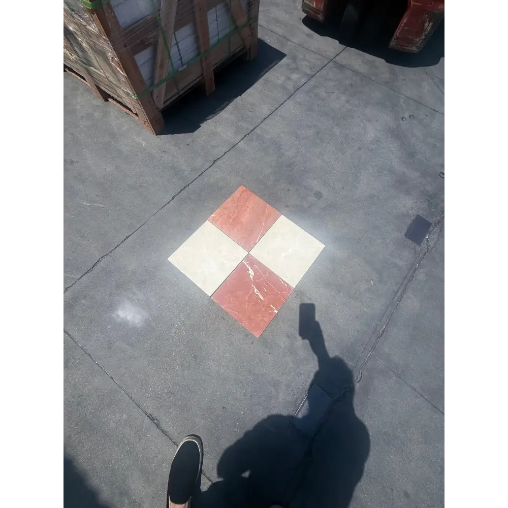 Four square tiles in a checkerboard pattern from Checkerboard Rojo Alicante Select and Crema Marfil Select Marble 12X12 Set