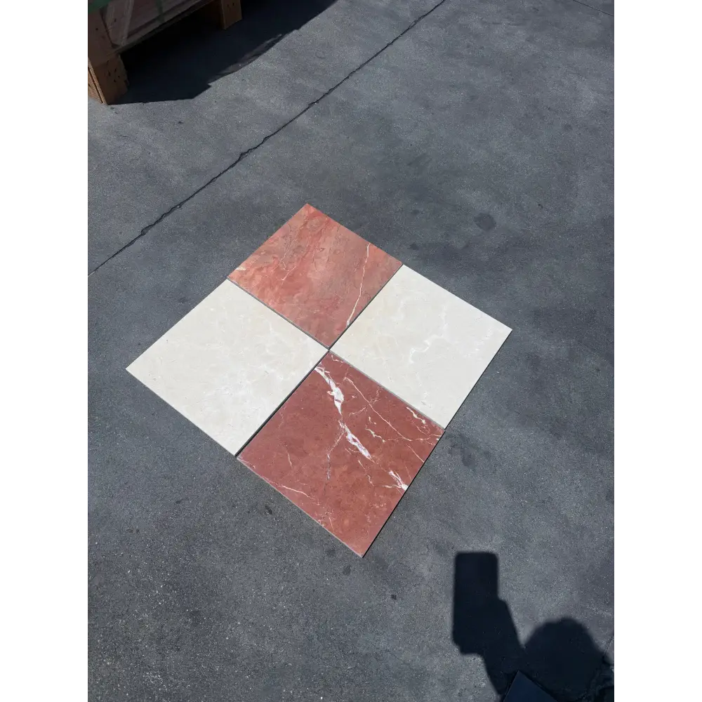 Four square tiles from Checkerboard Rojo Alicante Select and Crema Marfil Select Marble set