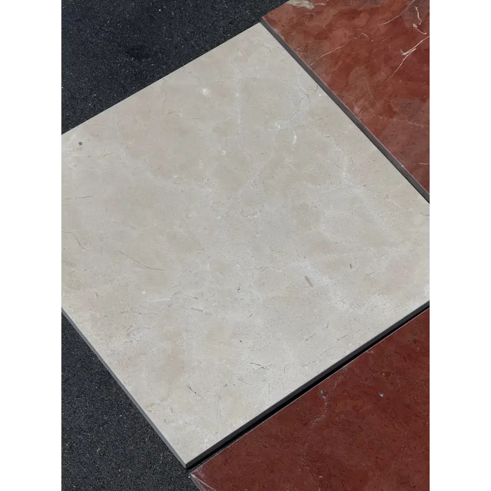 Square marble tile from Checkerboard Rojo Alicante Select and Crema Marfil Select Marble set
