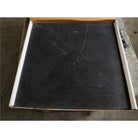 Black marble tiles in a box for Checkerboard Rosso Levanto and Nero Marquina 12X12 Set
