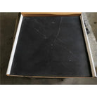 Square black tile with white veining from Checkerboard Rosso Levanto and Crema Marfil 12X12 Set