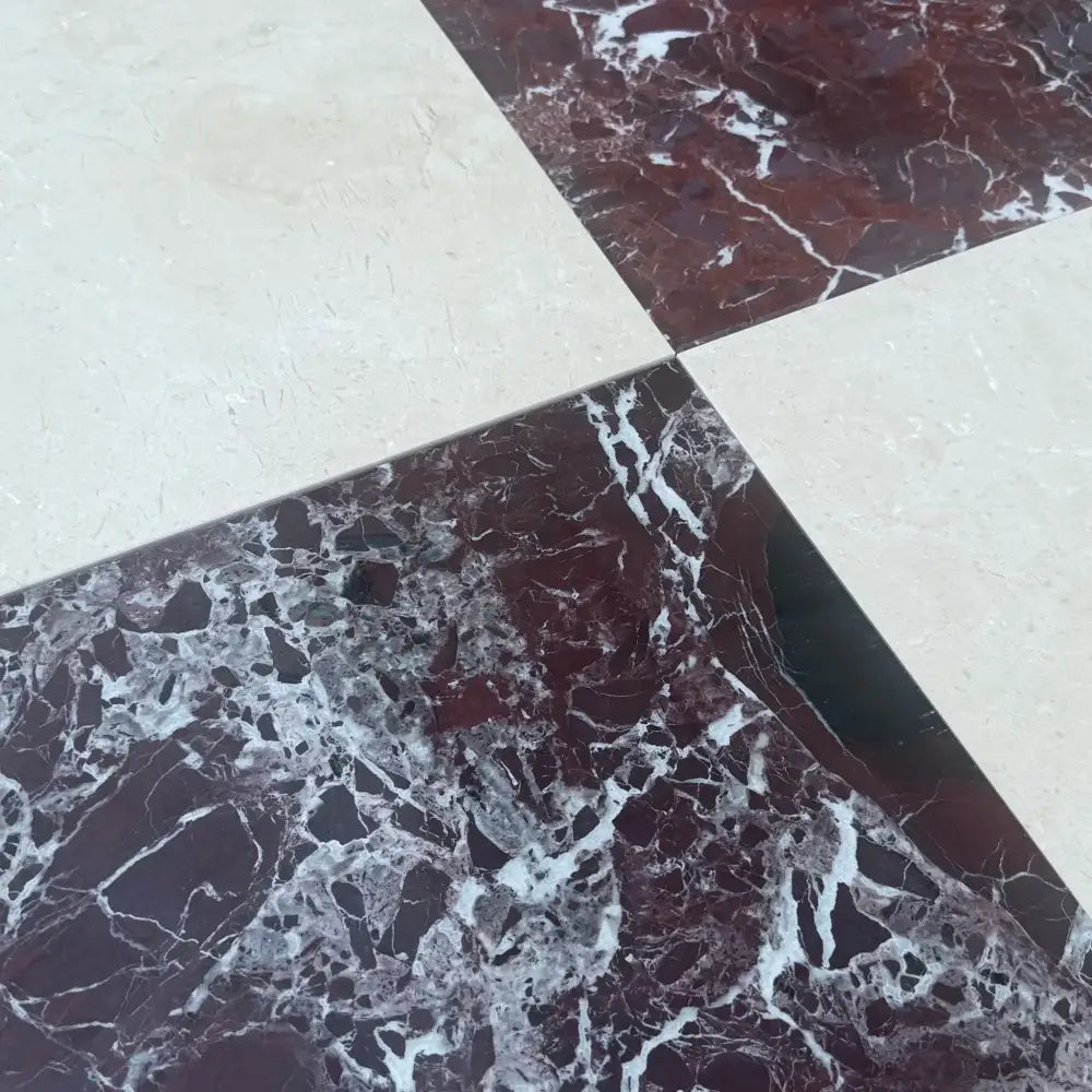 Checkerboard marble floor featuring Rosso Levanto and Crema Marfil tiles in 12x12 set