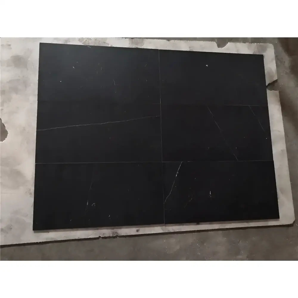 Black marble tiles in Checkerboard Rosso Levanto and Crema Marfil 12X12 Set