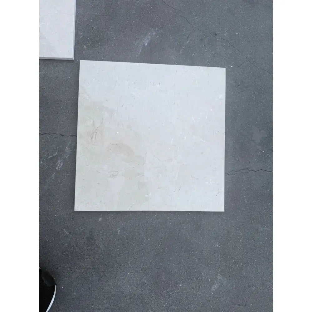 Square off-white tile from Checkerboard Rosso Levanto and Crema Marfil 12X12 Set