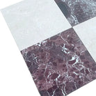 Checkerboard marble tiles in Rosso Levanto and Crema Marfil for elegant flooring