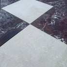 Alternating marble floor tiles in Checkerboard Rosso Levanto and Crema Marfil 12X12 Set