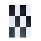 Black and white checkered tile pattern from Como in Dolomite Prestige and Nero Marquina Prestige set