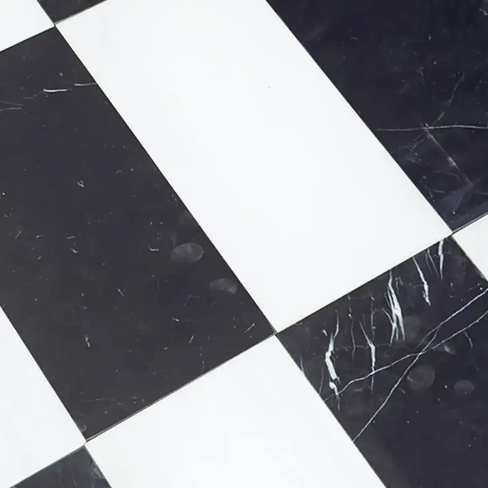 Black and white checkered floor tiles from Como in Dolomite Prestige and Nero Marquina Prestige set