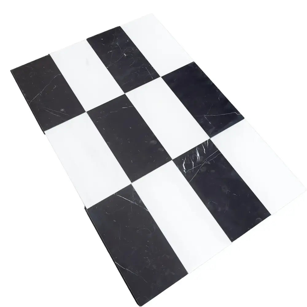 Black and white checkered floor tiles from Como in Dolomite Prestige and Nero Marquina Prestige set