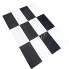 Black and white checkered floor tiles from Como in Dolomite Prestige and Nero Marquina Prestige set