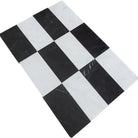 Rectangular black and white checkered tiles from Como in Carrara White Royale and Nero Marquina Prestige set
