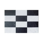 Black and white checkered marble tiles from Como in Carrara White Royale and Nero Marquina Prestige set