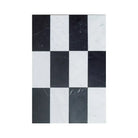 Black and white checkered tile pattern from Como in Carrara White Royale and Nero Marquina Prestige set