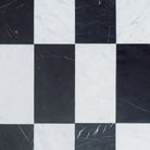 Black and white checkered marble tiles from Como in Carrara White Royale and Nero Marquina Prestige set